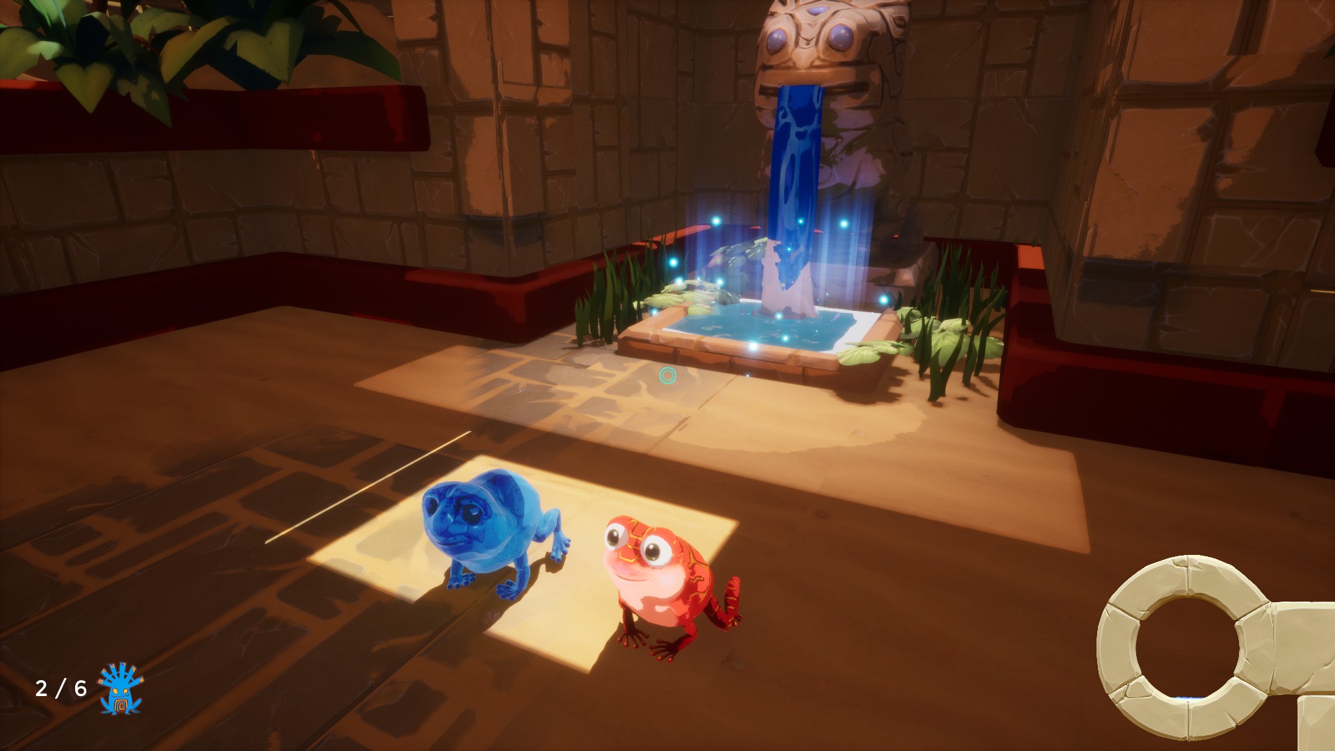 Obligatory screenshot. There is a red frog standing next to a blue frog statue, in front of a fountain